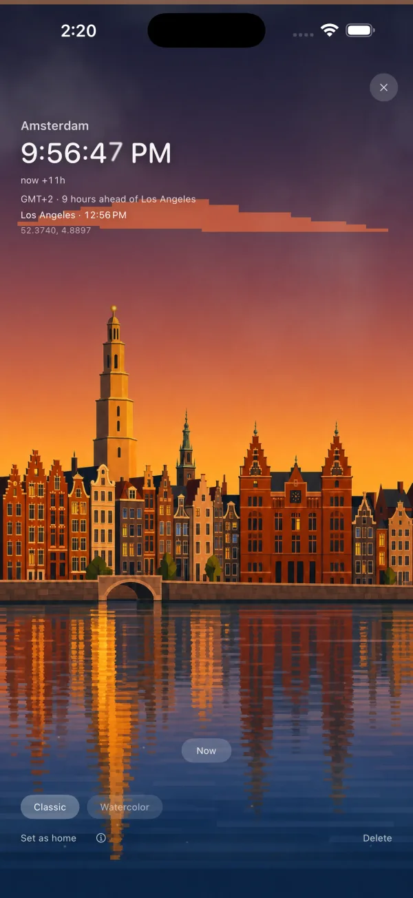 Amsterdam canal houses glowing at dusk, reflected in the water